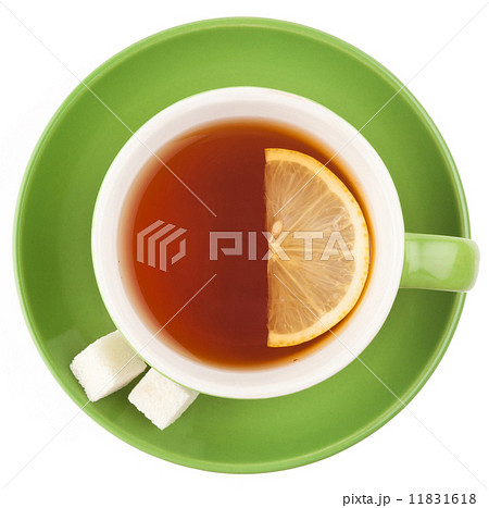Green teacup with sugar and lemon. 11831618