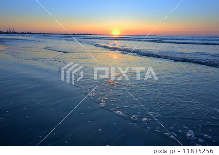 Sunrise on the sea shore 11835256