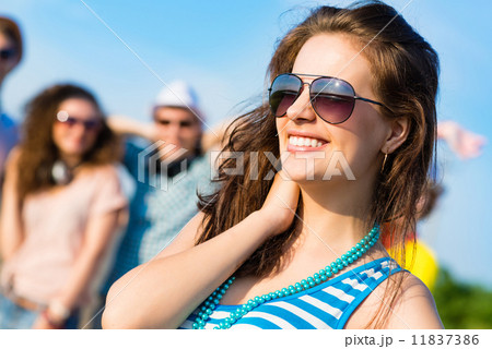 stylish young woman in sunglasses 11837386