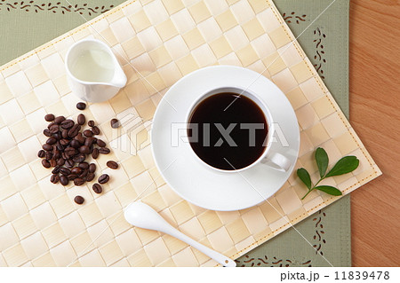 Coffee bean and hot coffee with green leaf 11839478