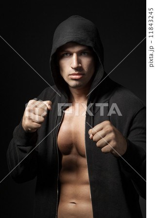 strong man fighter portrait isolated on black background 11843245