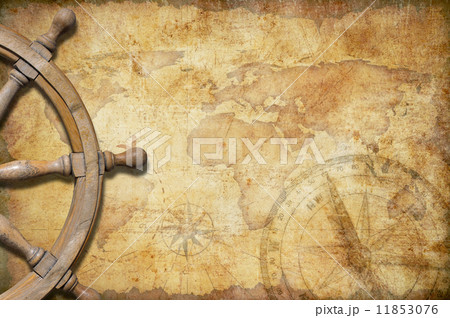 aged treasure map with steering wheel 11853076