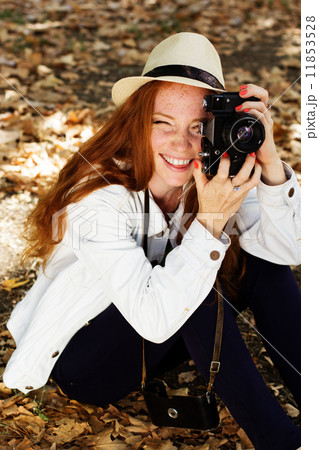 Nice girl photographer at work 11853528