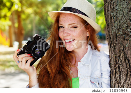 Nice girl photographer at work Nice girl photographer at work 11856943