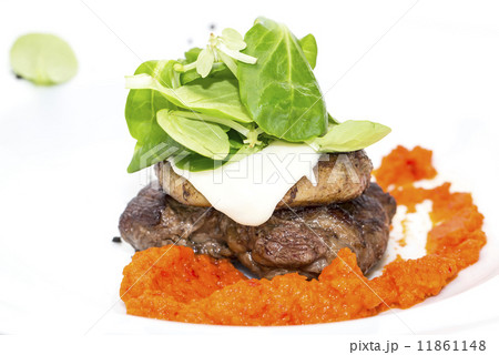 baked meat in a sauce of peppers and tomatoes baked meat in a sauce of peppers and tomatoes 11861148