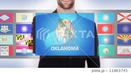 Hand pushing on a touch screen interface 11863745