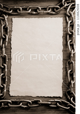 metal chain and old paper 11882608