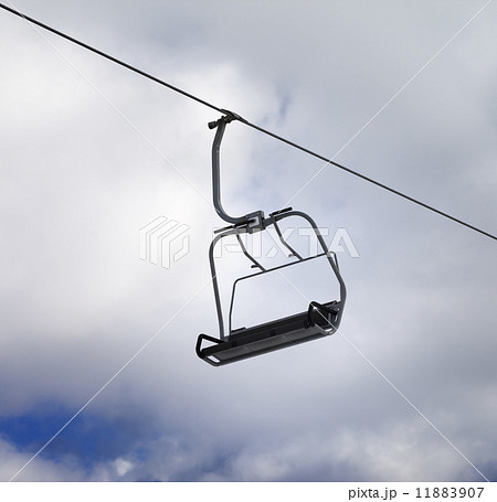 Chair-lift and cloudy sky Chair-lift and cloudy sky 11883907