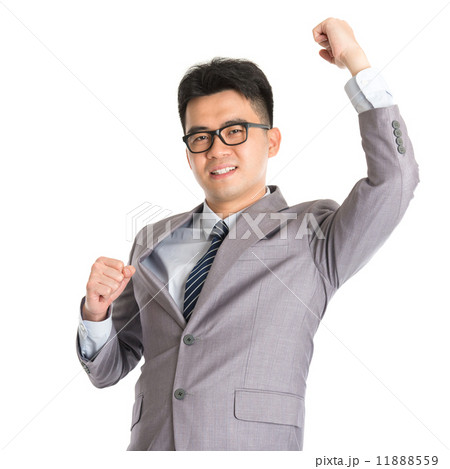 Asian businessman celebrating success Asian businessman celebrating success 11888559