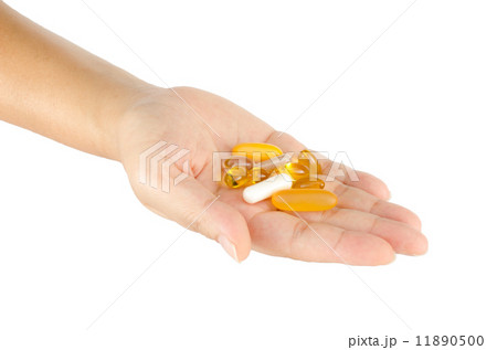 Vitamin in woman's hand Vitamin in woman's hand 11890500