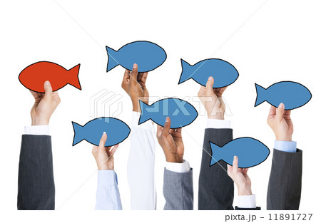 Business People Holding Fish Symbol and Contrasts Concept Business People Holding Fish Symbol and Contrasts Concept 11891727