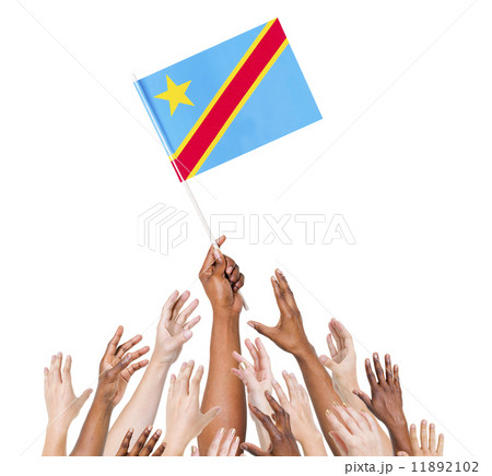 Group Of Multi-Ethnic People Reaching For And Holding The Flag O 11892102