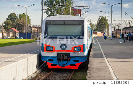 Modern suburban electric train standing at the station in Russia Modern suburban electric train standing at the station in Russia 11892502