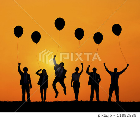 Business People Jumping While Holding Balloons 11892839