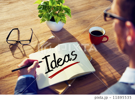 Man with a Notepad with Text Ideas Man with a Notepad with Text Ideas 11895535