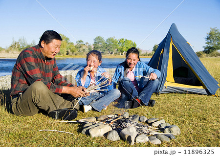 Mongolian Family Anjoy Camping by The River 11896325