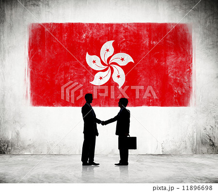 Two Businessmen Shaking Hands With FLag Of Hong Kong As A Backgr Two Businessmen Shaking Hands With FLag Of Hong Kong As A Backgr 11896698