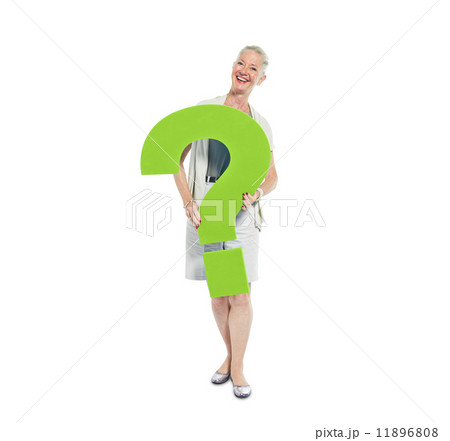 A Casual Woman Holding a Green Question Mark A Casual Woman Holding a Green Question Mark 11896808