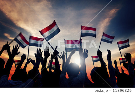 Silhouettes of People Waving the Flag of Iraq Silhouettes of People Waving the Flag of Iraq 11896829