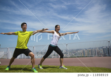 Young Asian Adults exercising 11898919