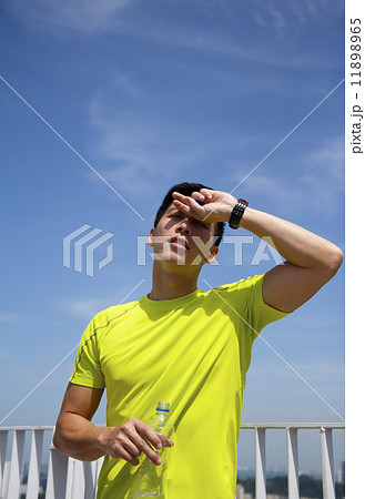 Asian man suffering from heat stroke 11898965
