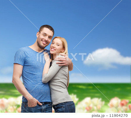 smiling couple hugging 11904270