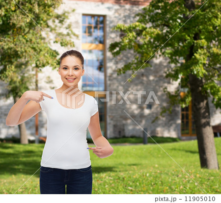 smiling young woman in blank white t-shirt 11905010