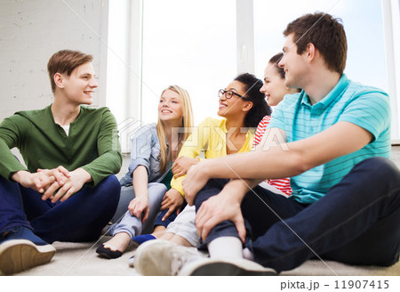 five smiling teenagers having fun at home 11907415