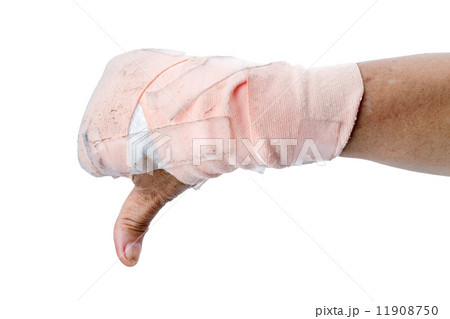 Thumb down showing by hand with bandages isolated on white 11908750