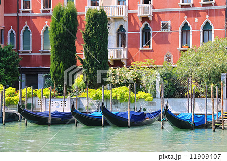 Gondolas at berth of the Grand Canal near the picturesque mansio 11909407