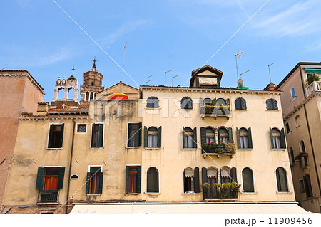 Picturesque Italian house on a background of Church Santa Maria 11909456