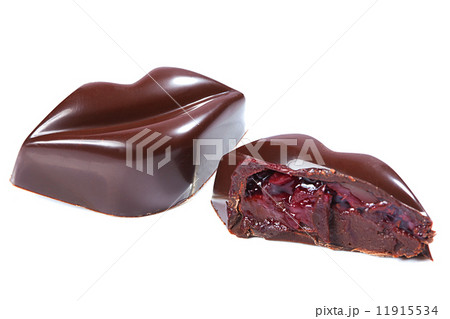 Chocolate candy in form of lips with cherry 11915534