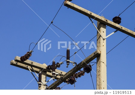A power line on a blue sky 11919513