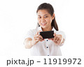 Asian woman using smartphone 11919972