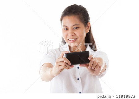 Asian woman using smartphone Asian woman using smartphone 11919972