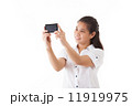 Asian woman using smartphone 11919975