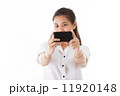 Asian woman using smart phone 11920148