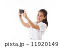 Asian woman using smart phone 11920149