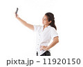 Asian woman using smart phone 11920150