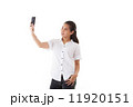 Asian woman using smart phone 11920151