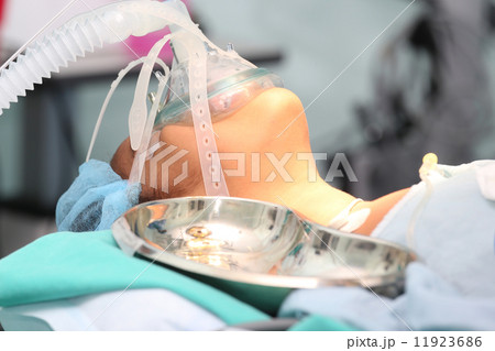 Patient with a breathing mask in operation room 11923686