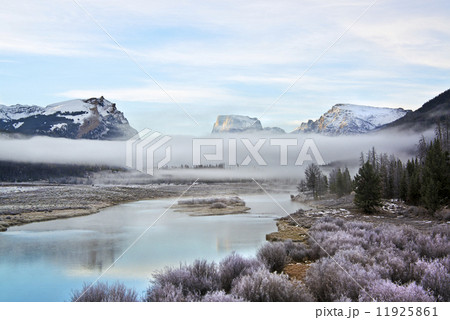 View of Squaretop Mountain, and the Wind River, at dawn, with low hanging mist over the valley.  11925861