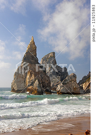 Ursa Beach on the Atlantic coastline has dramatic rock formations called the Giant and the Bear.  11925863