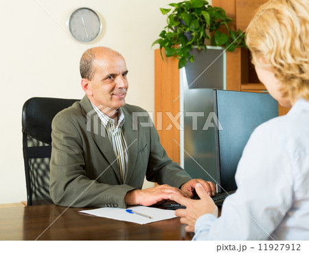 Pensioner at notary's office Pensioner at notary's office 11927912