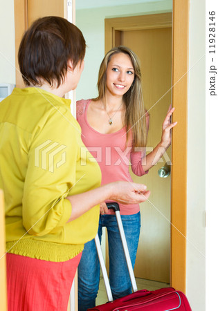 Adult daughter saying goodbye to mom Adult daughter saying goodbye to mom 11928146