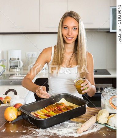 Woman cooking apple pie Woman cooking apple pie 11929041