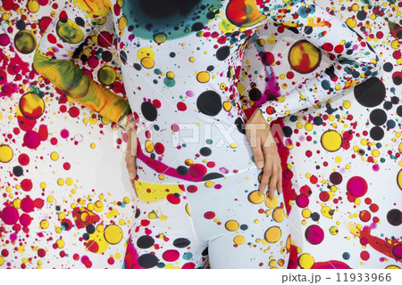 female hand on colour wall 11933966