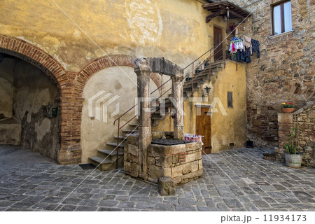 san quirico medieval houses with water well 11934173
