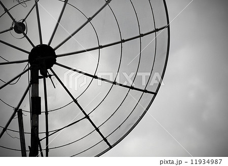 Old parabolic antenna on sky background Old parabolic antenna on sky background 11934987