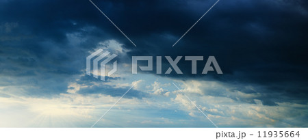 Panorama - sunbeams in stormy dark cloudy sky Panorama - sunbeams in stormy dark cloudy sky 11935664